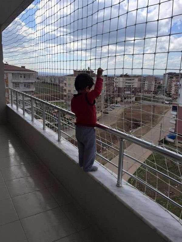 Real children safety net in a family balcony