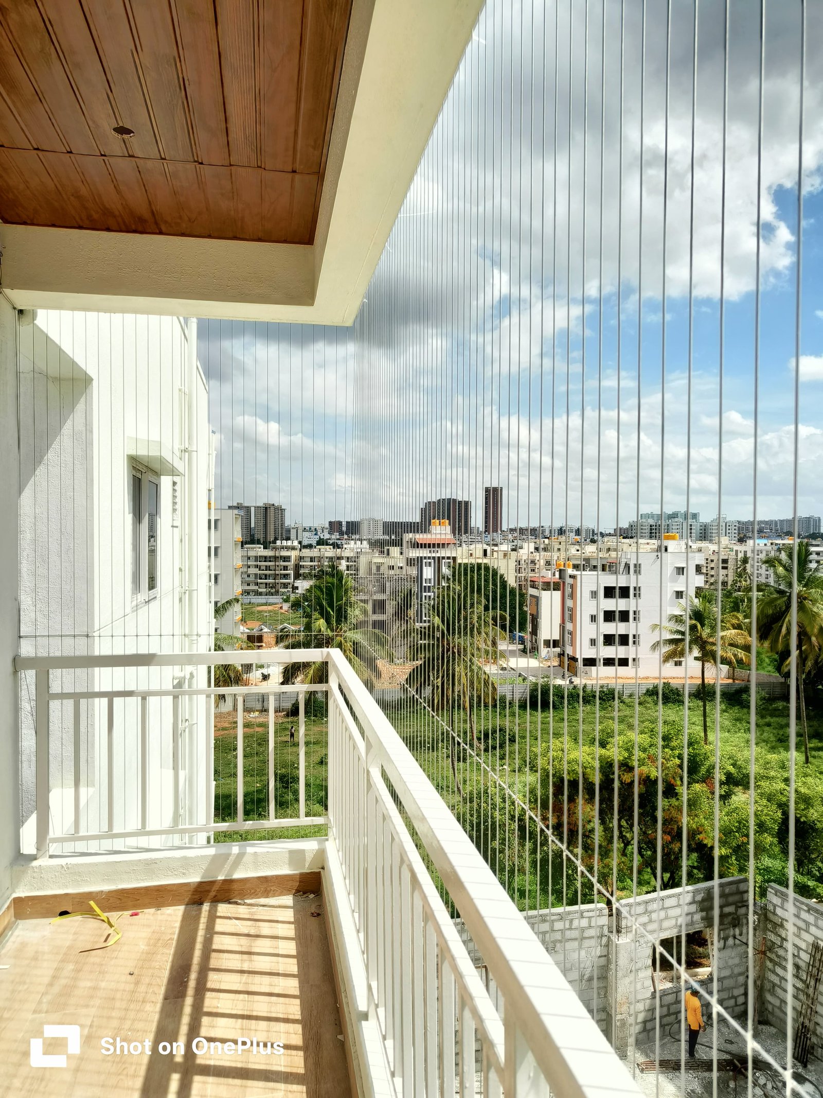 Real invisible grill installation in an apartment balcony