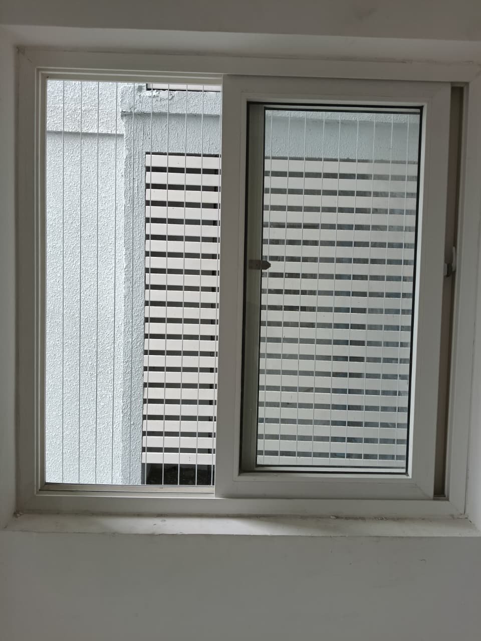 Real window invisible grill installation